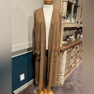 Stunning Lularoe cardigan! Size M, but fits S-XL. Excellent condition